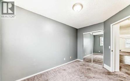 202 Saddlemead Green NE