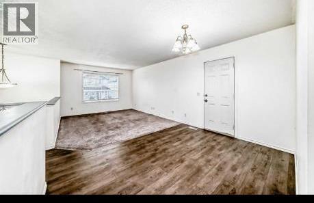 202 Saddlemead Green NE