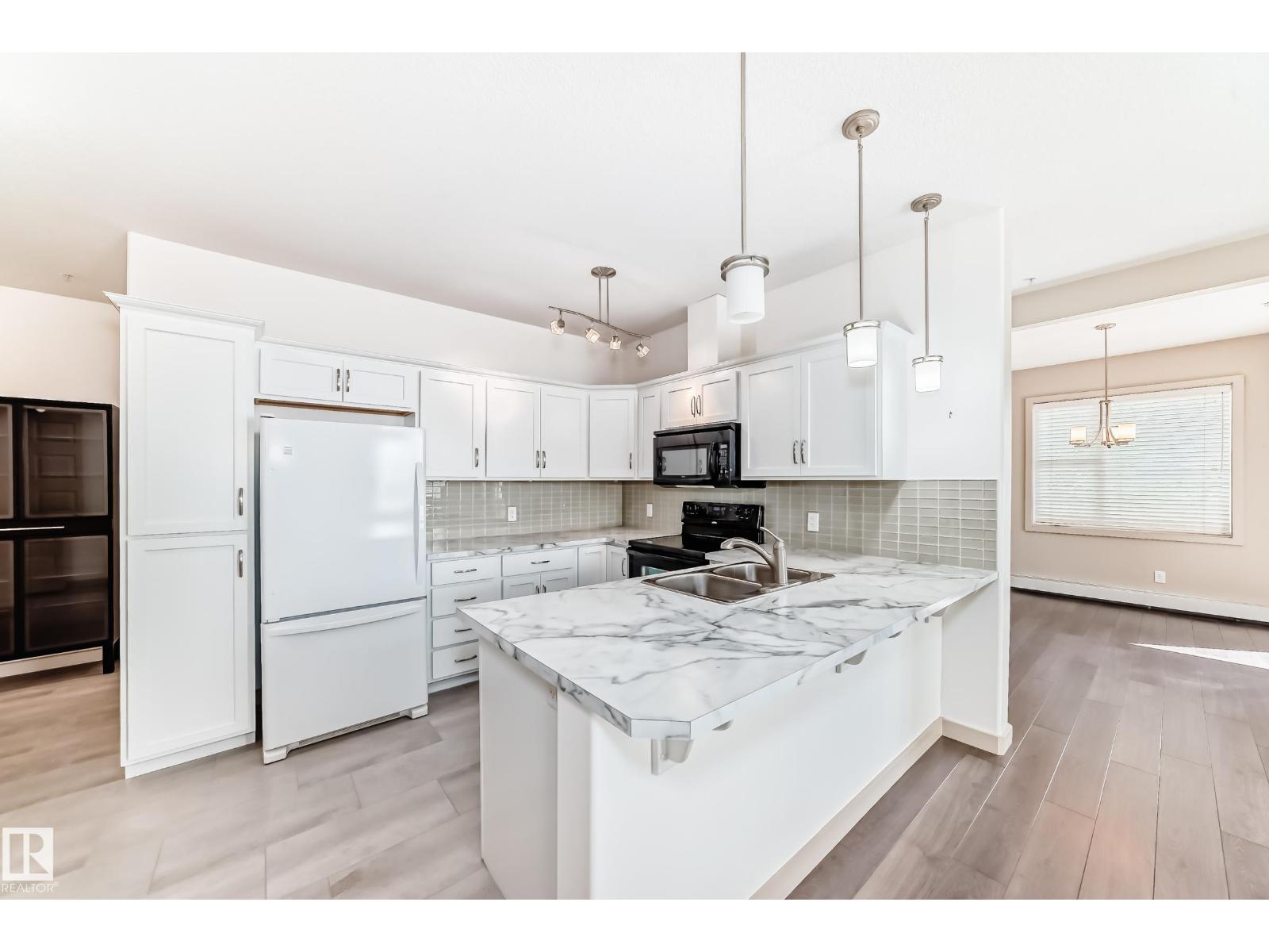 #202 304 AMBLESIDE LI SW