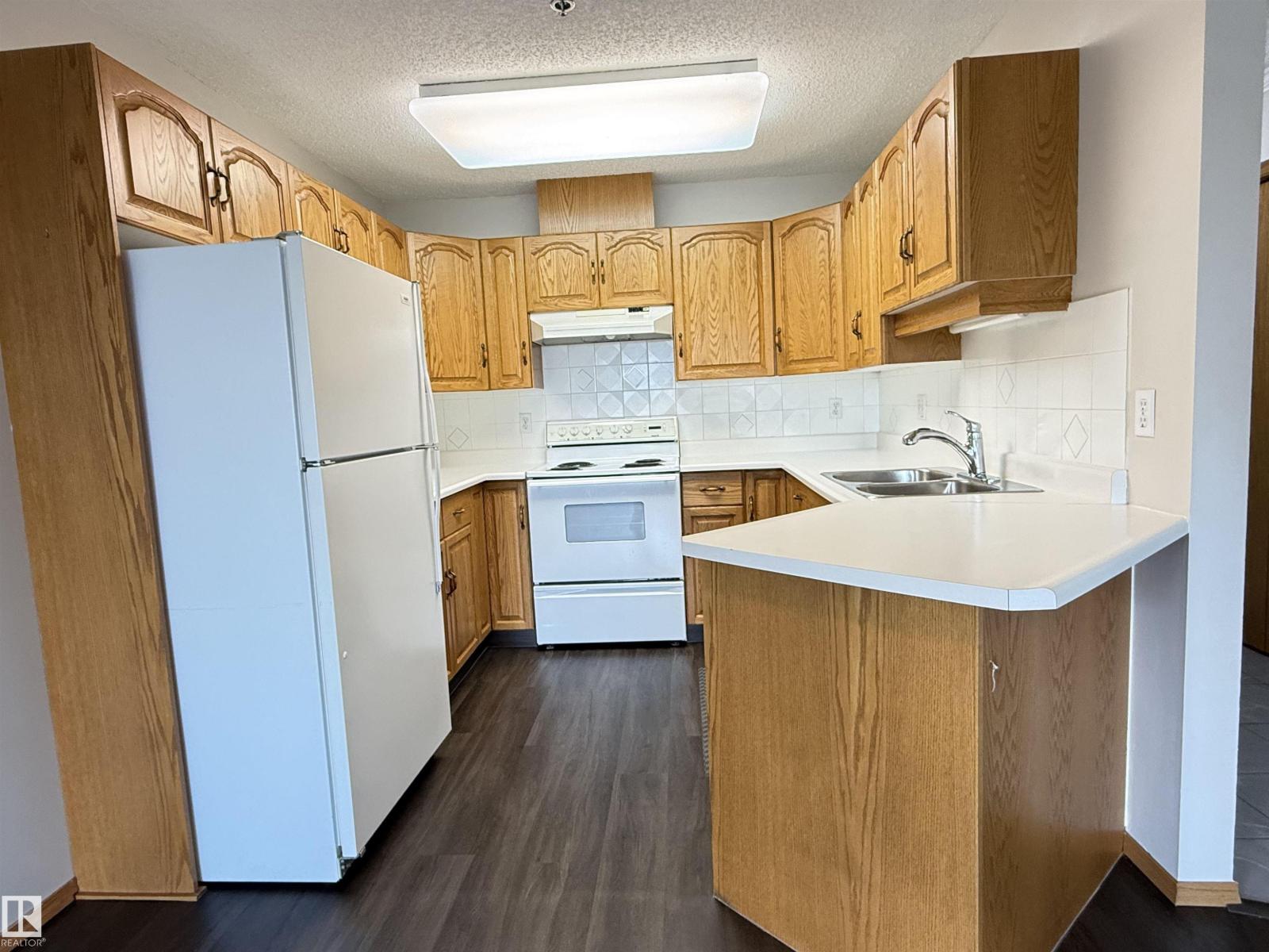 #309 10610 76 ST NW