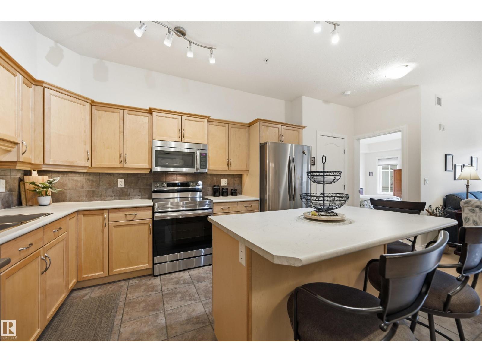 #338 1406 HODGSON WY NW