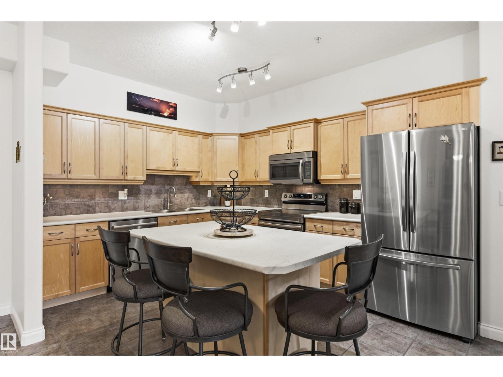#338 1406 HODGSON WY NW