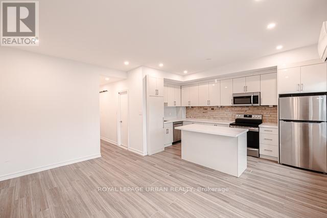 3 - 991 QUEEN STREET E