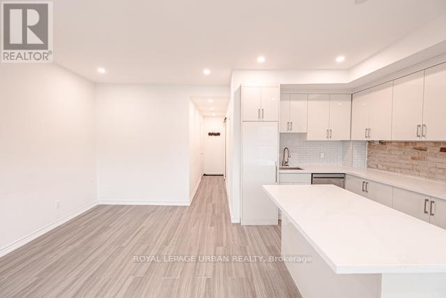 3 - 991 QUEEN STREET E