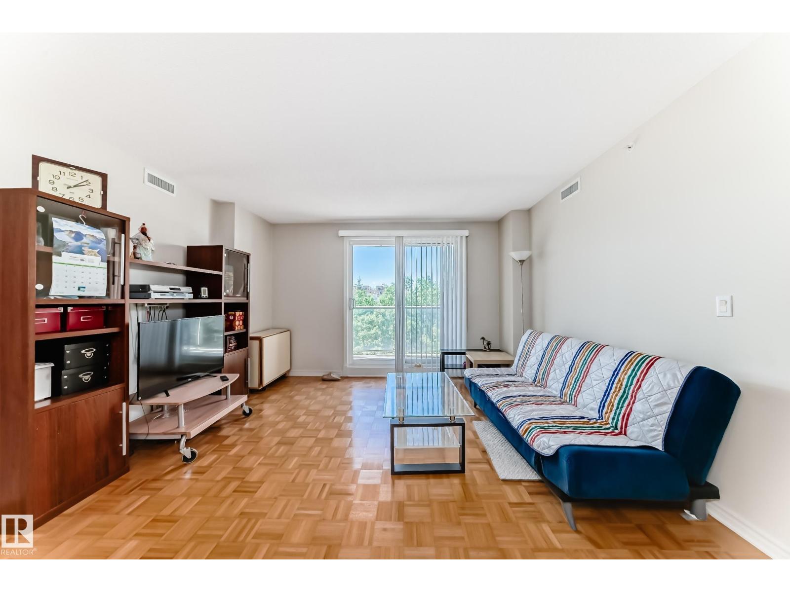 #406 10909 103 AV NW