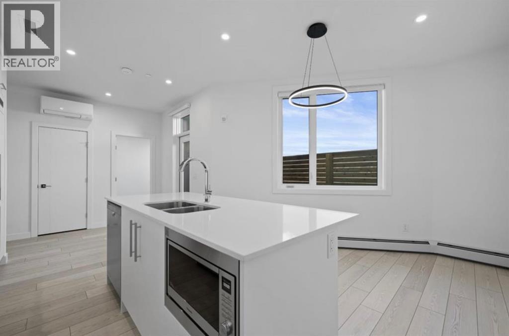 102, 8370 Broadcast Avenue SW