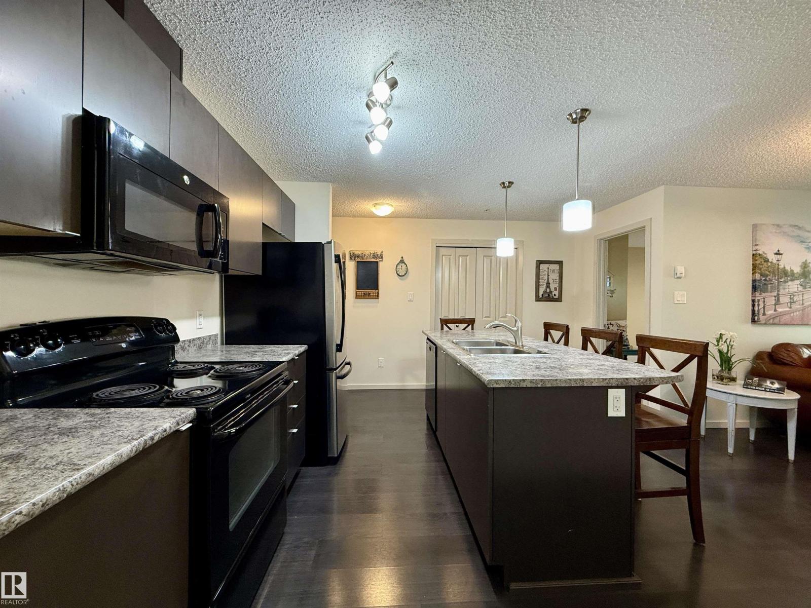 #202 340 WINDERMERE RD NW