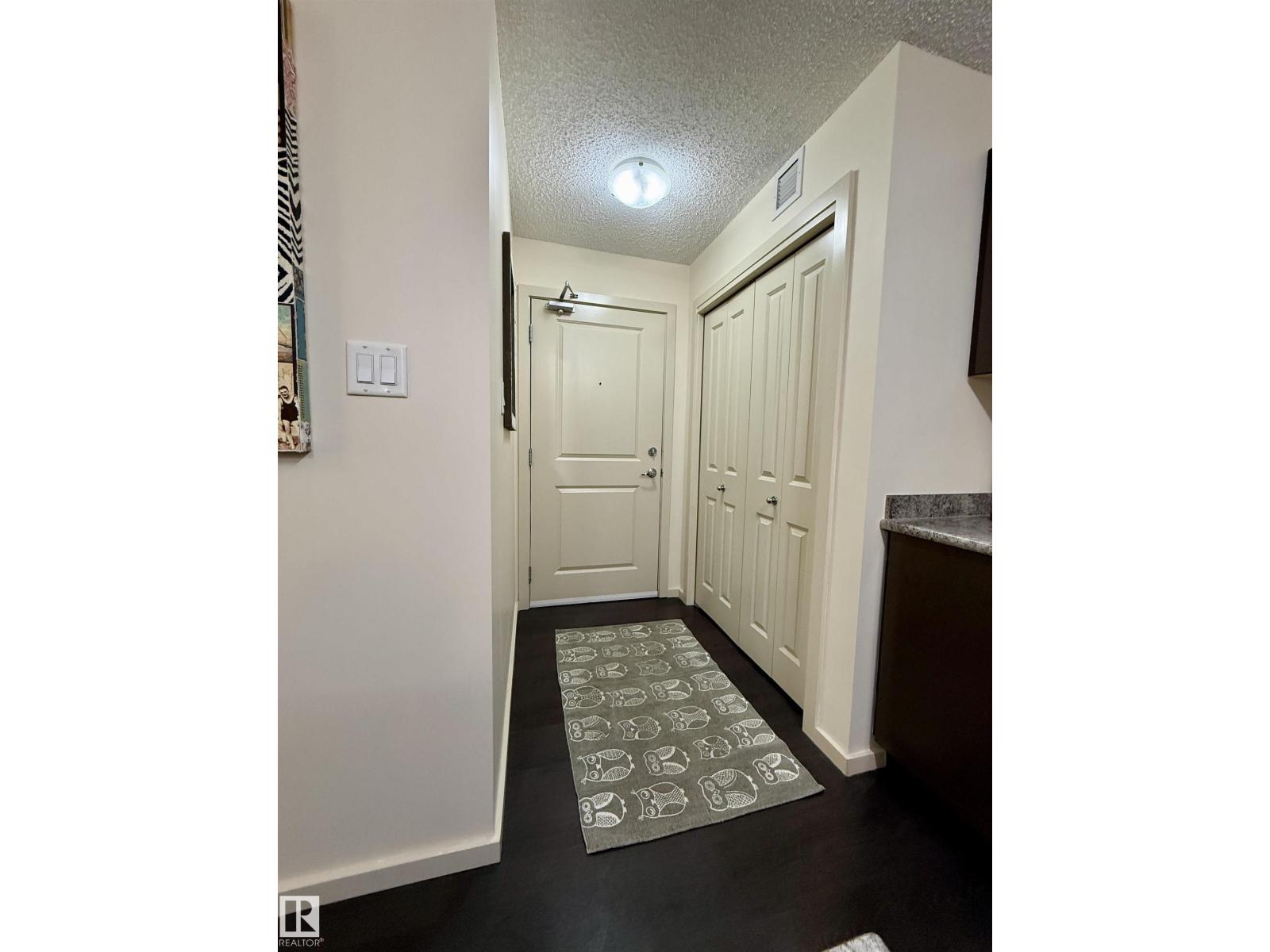 #202 340 WINDERMERE RD NW