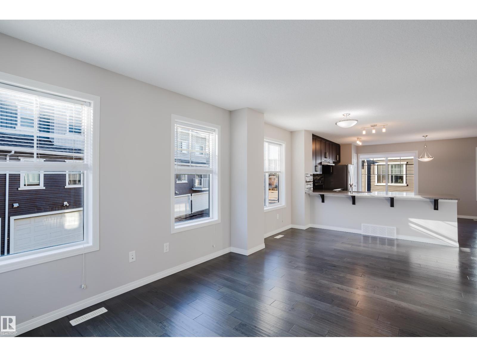 #47 7385 EDGEMONT WY NW