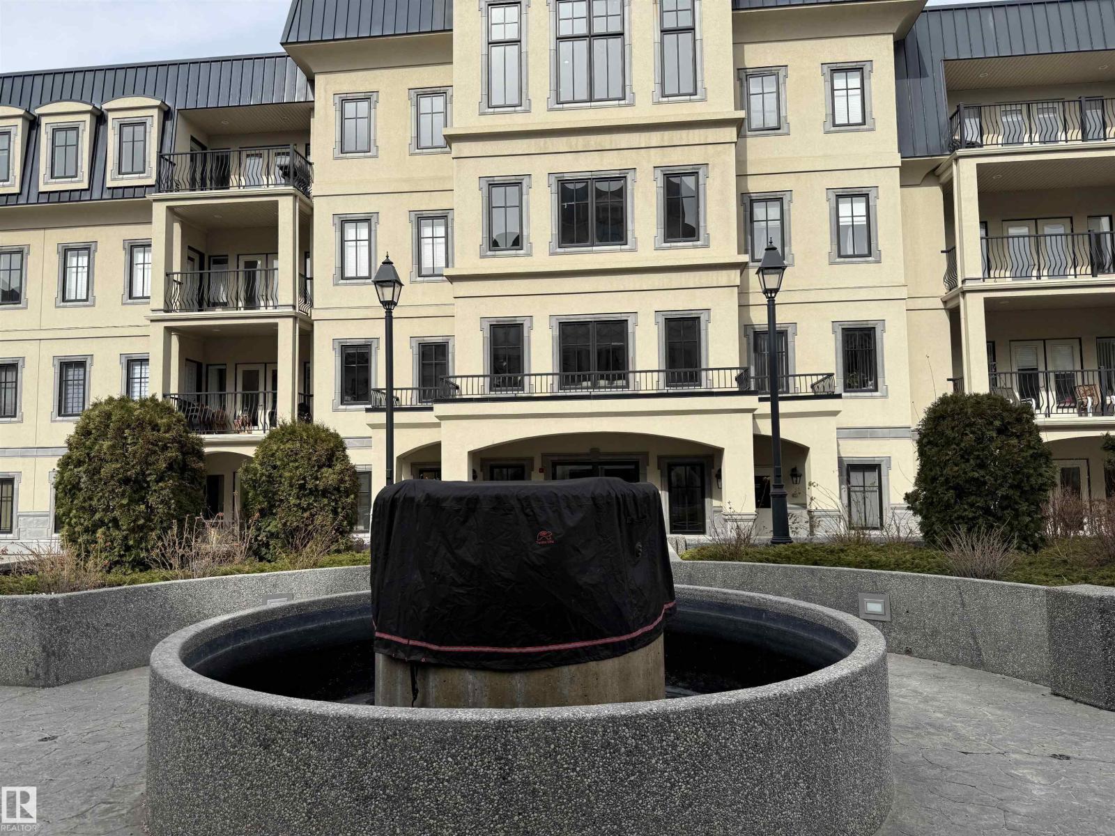 #438 1406 HODGSON WY NW