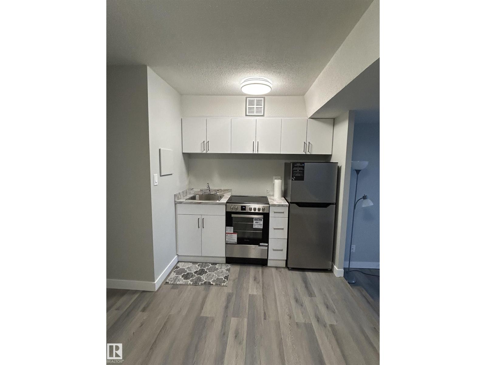 #714 10160 114 ST NW NW