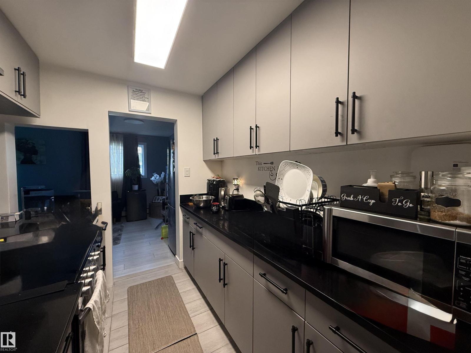 #102 12409 82 ST NW