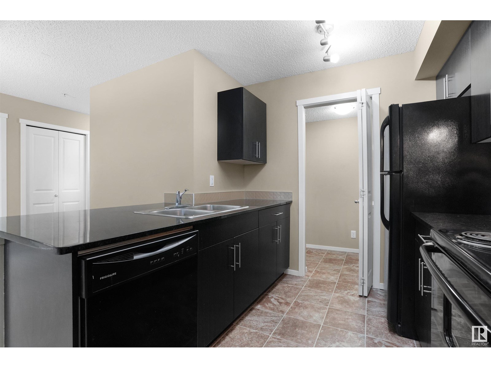 #214 5816 MULLEN PL NW