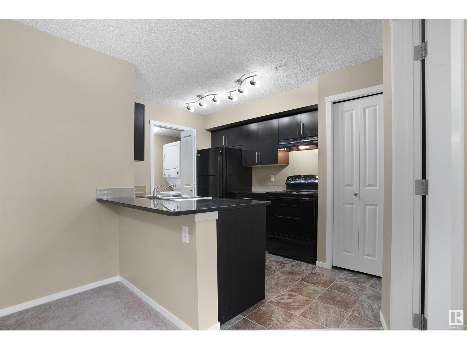 #214 5816 MULLEN PL NW