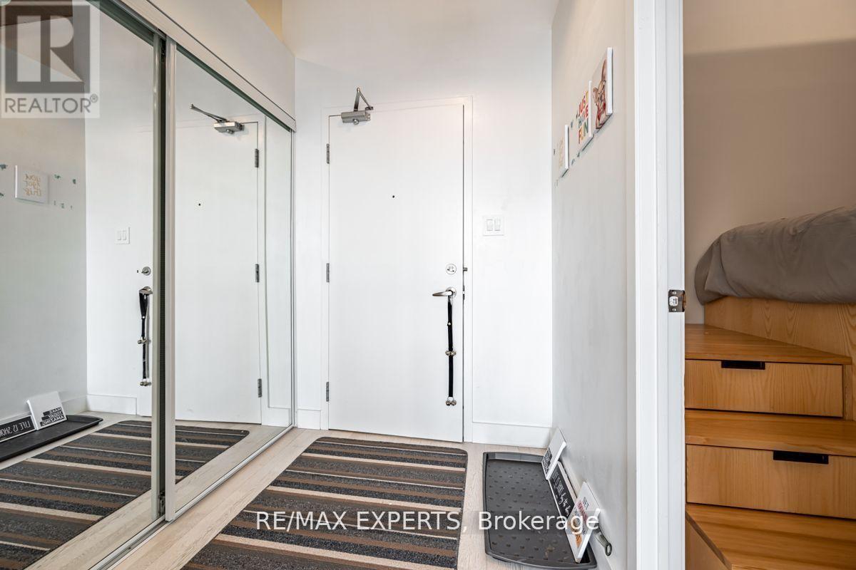 411 - 955 QUEEN STREET W