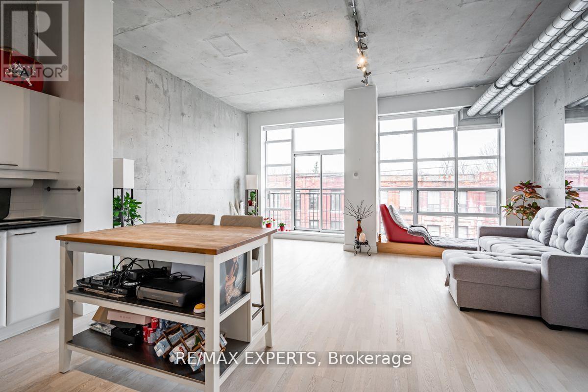 411 - 955 QUEEN STREET W