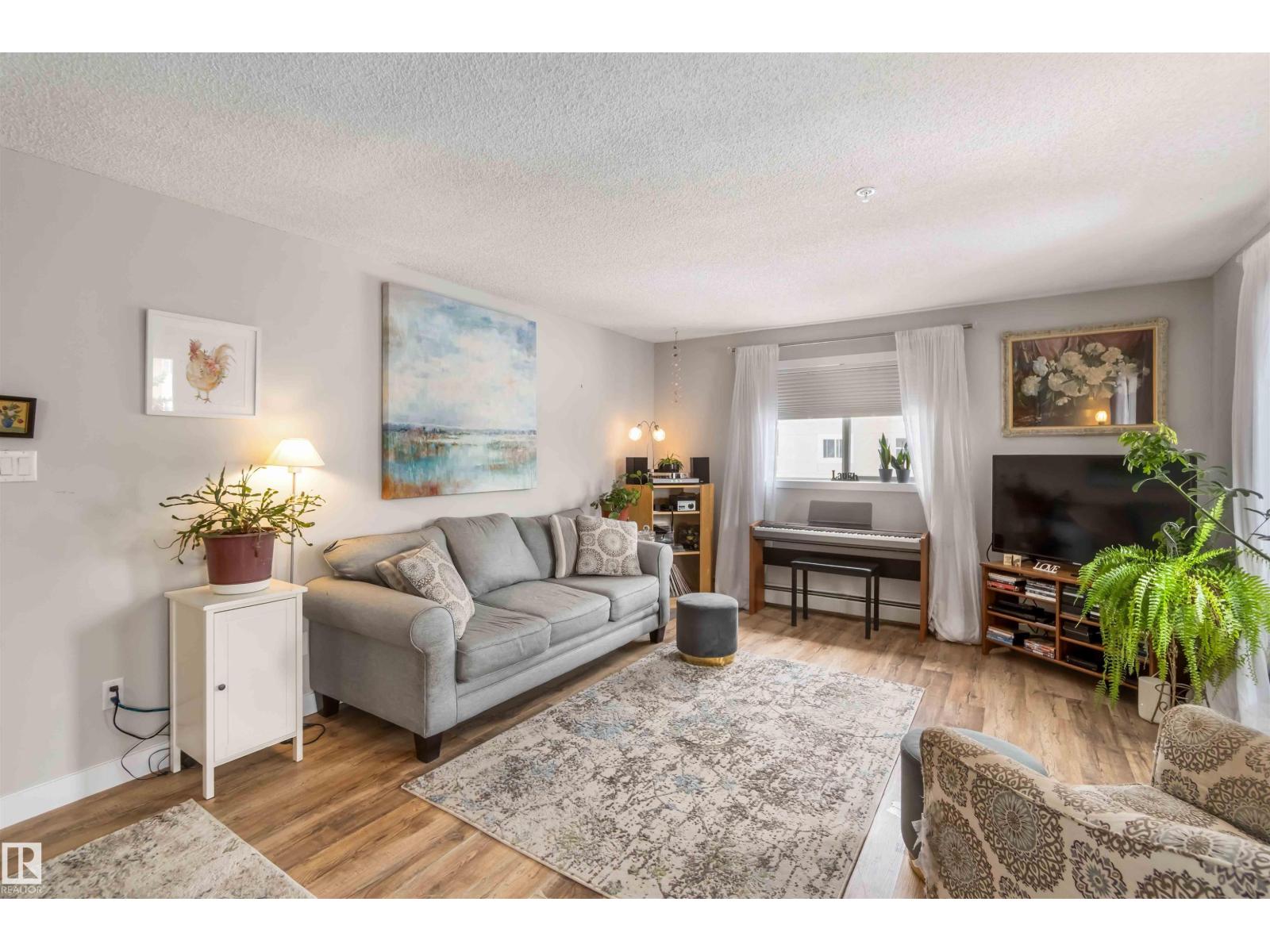 #329 17447 98A AV NW