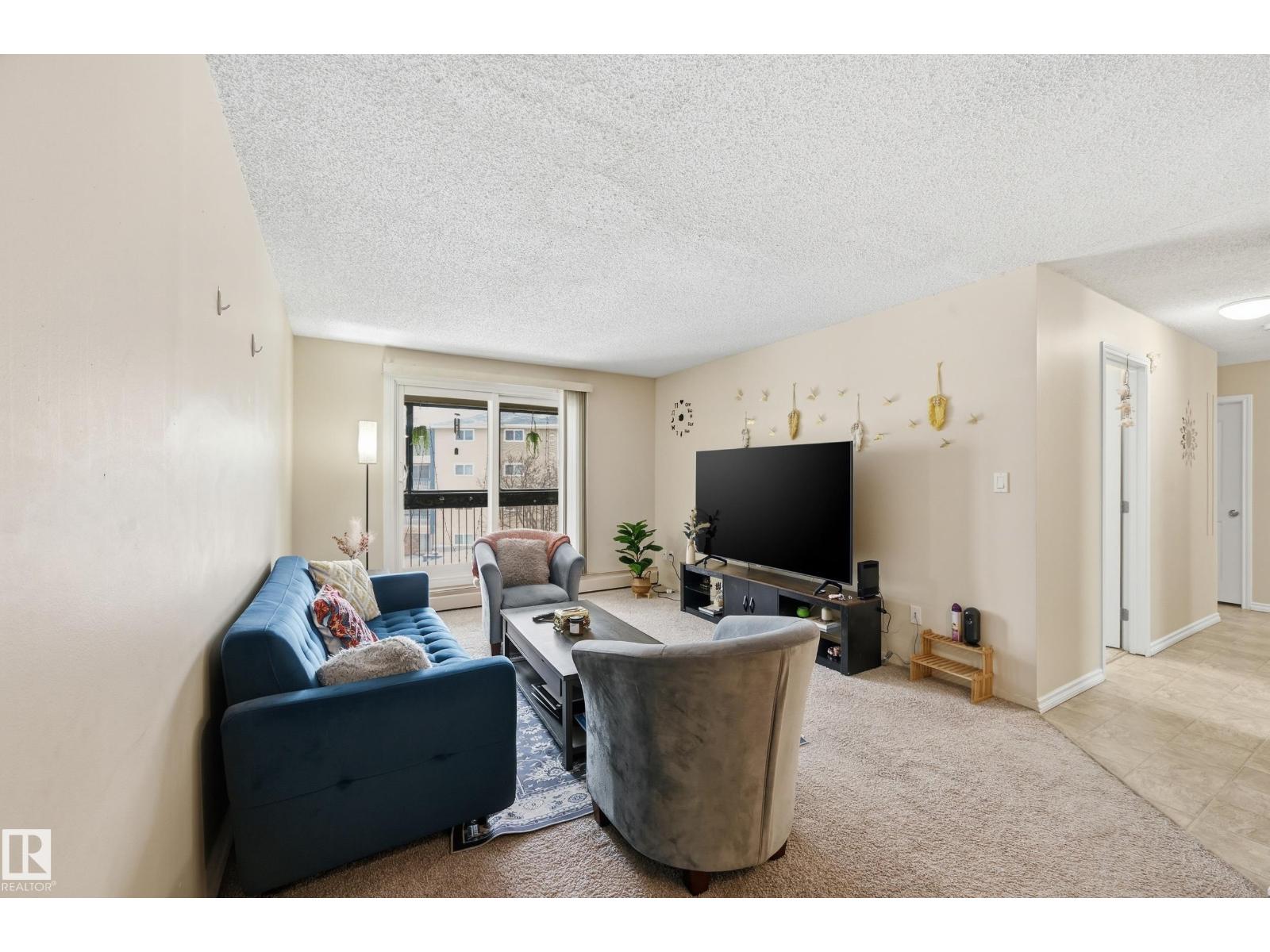 #302 2624 MILL WOODS RD E NW