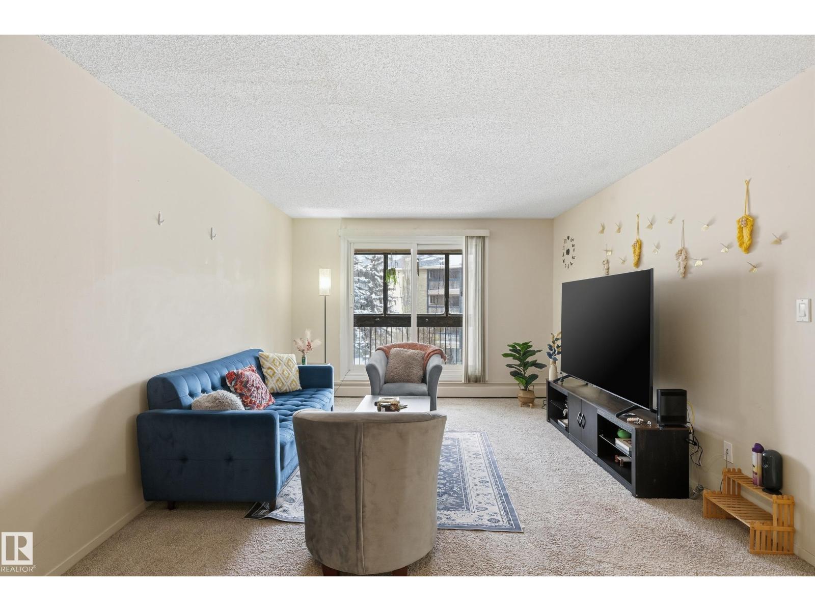 #302 2624 MILL WOODS RD E NW