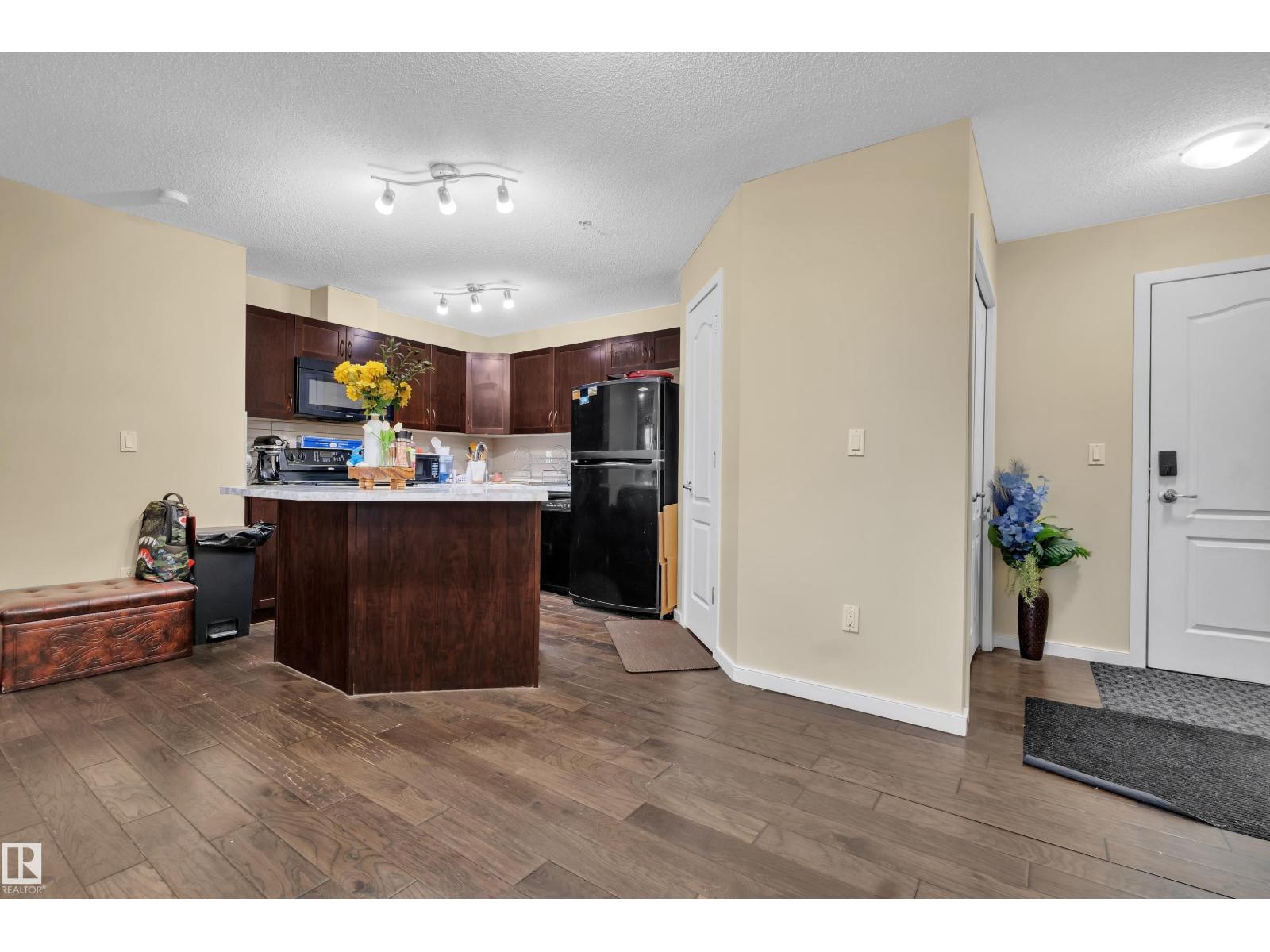 #320 392 SILVER BERRY RD NW