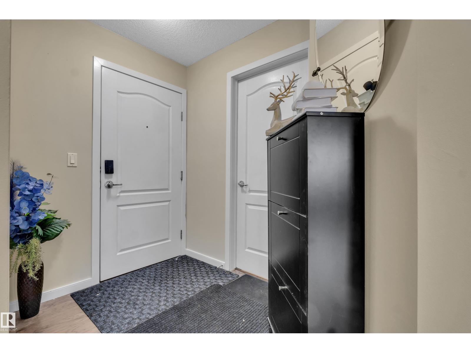 #320 392 SILVER BERRY RD NW