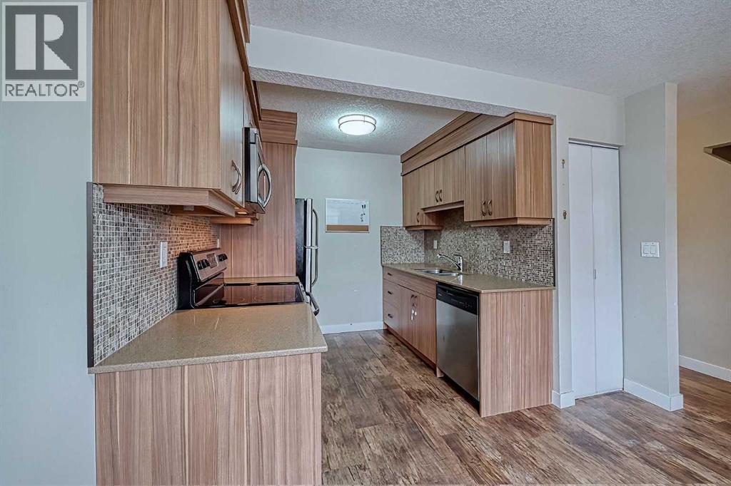 72, 6100 4 Avenue NE