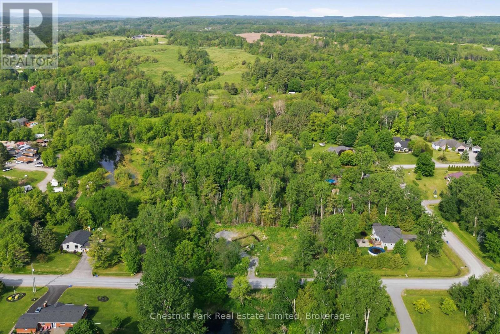 40 WHISPERING WOODS DRIVE