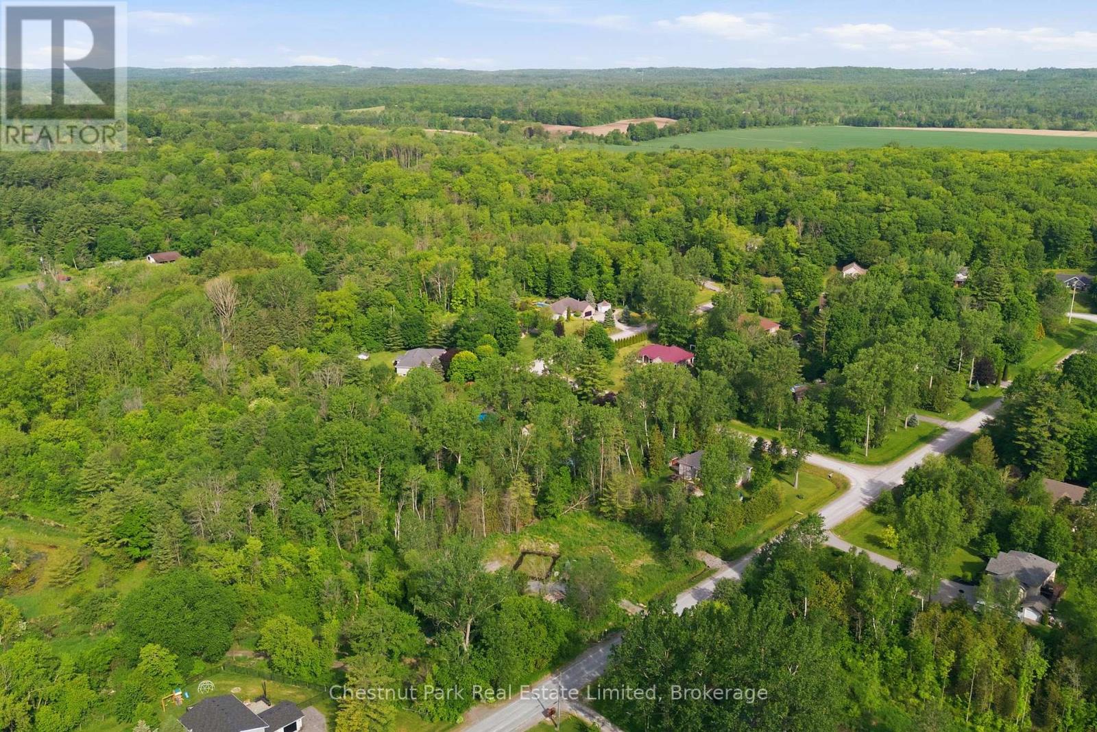 40 WHISPERING WOODS DRIVE
