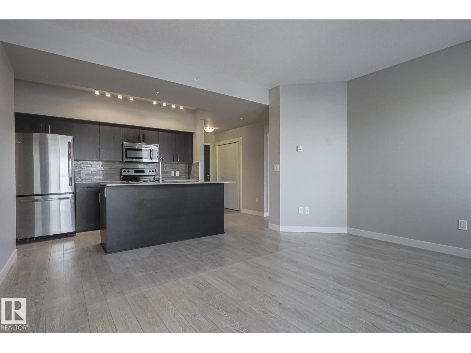 #703 10226 104 ST NW