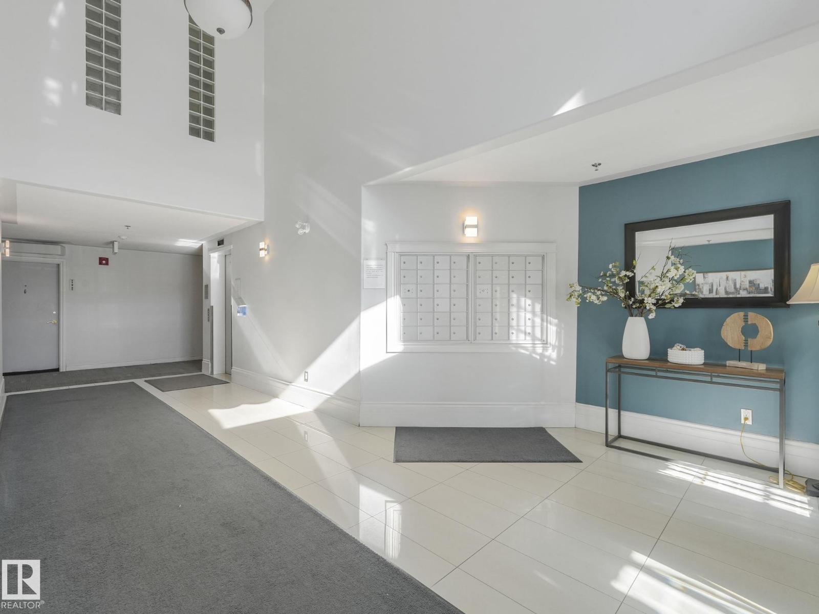 #208 12028 103 AV NW