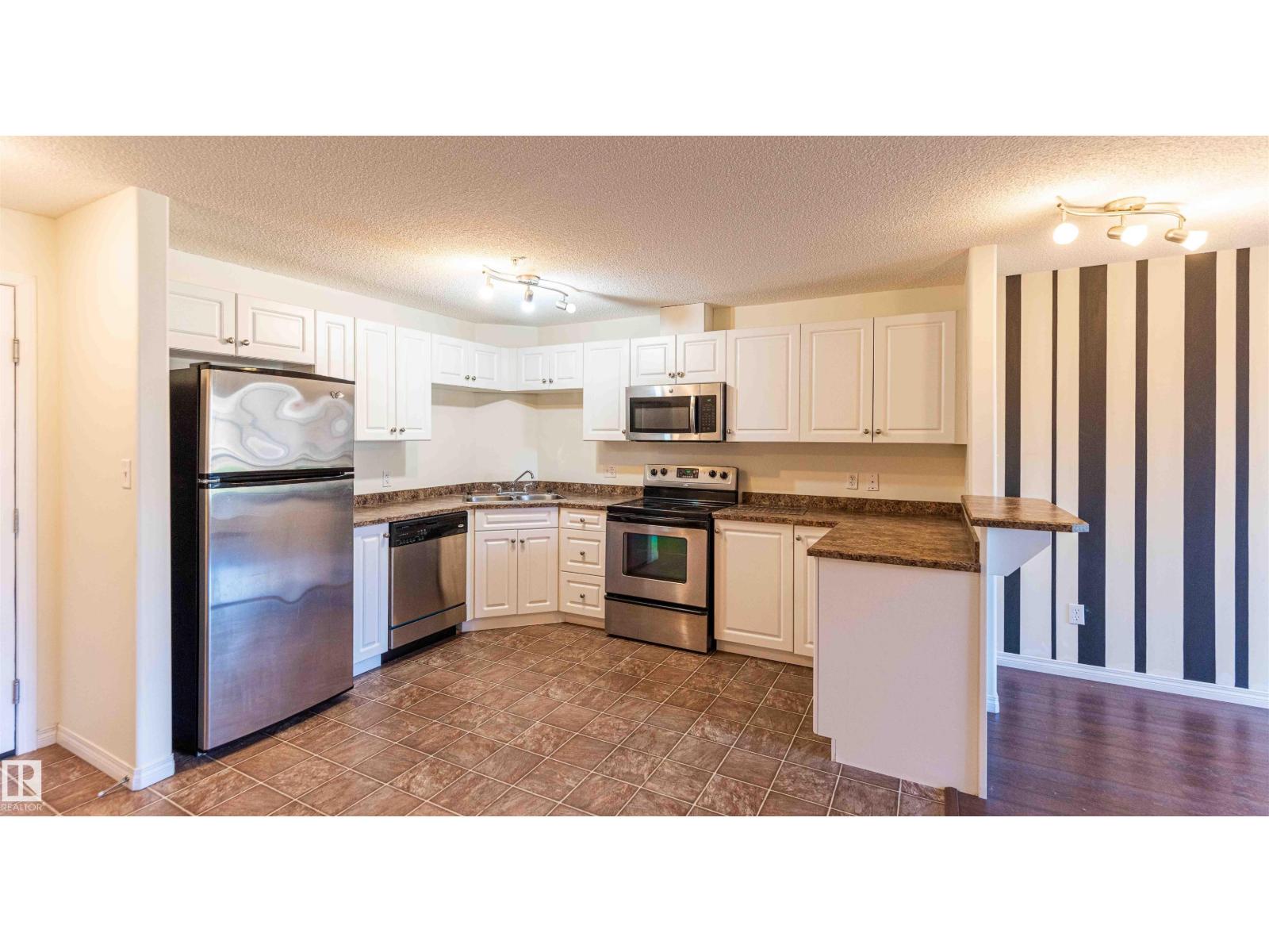 #1111 7339 SOUTH TERWILLEGAR DR NW