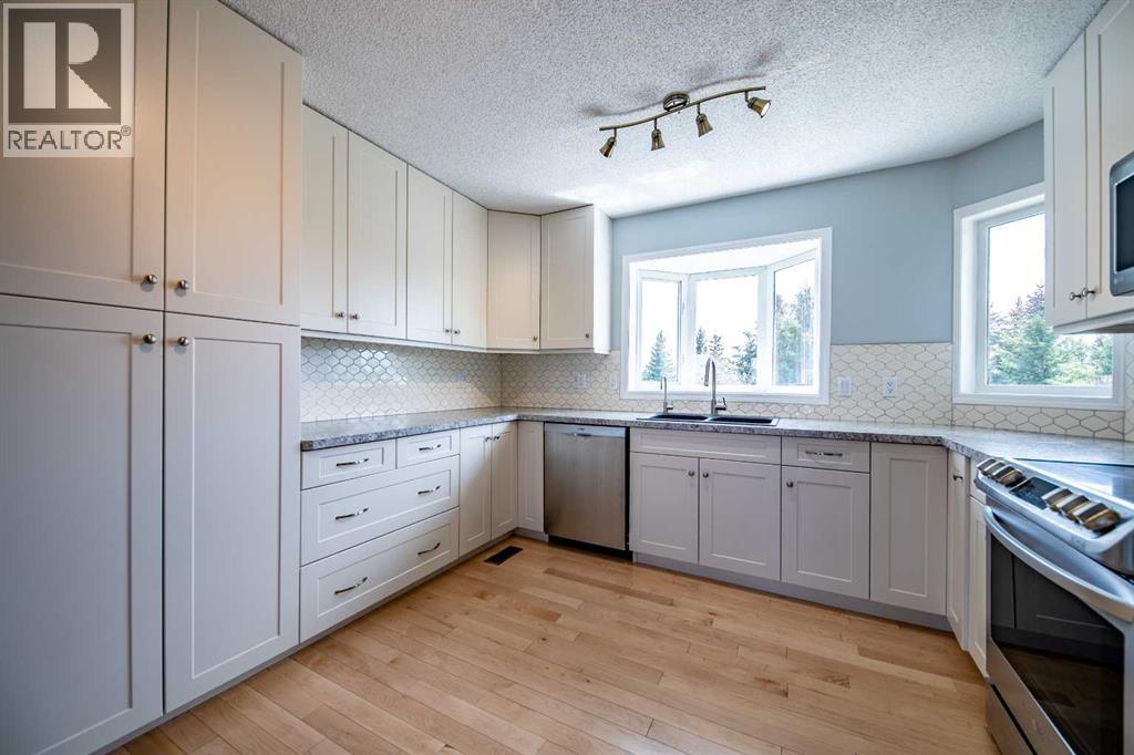 12, 712074 Range Rd 55