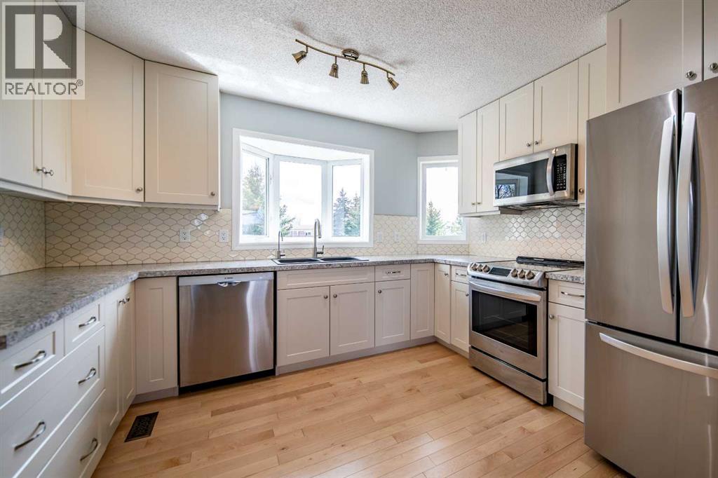 12, 712074 Range Rd 55