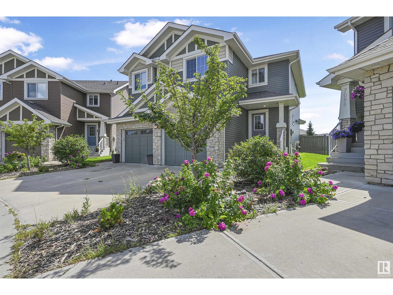 7086 SOUTH TERWILLEGAR DR NW