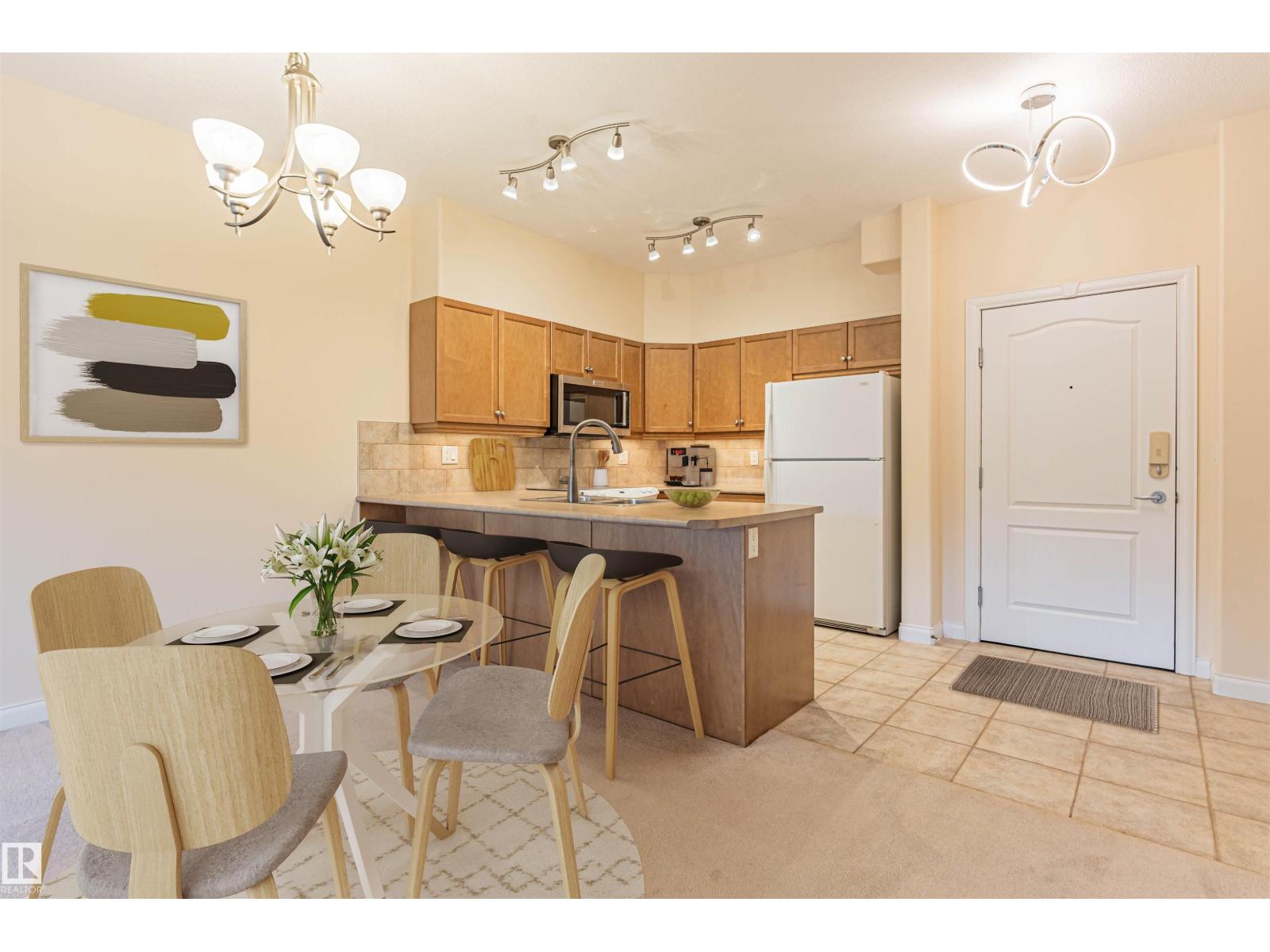 #110 1406 HODGSON WY NW