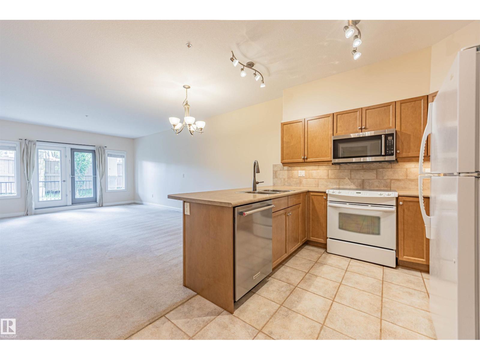 #110 1406 HODGSON WY NW