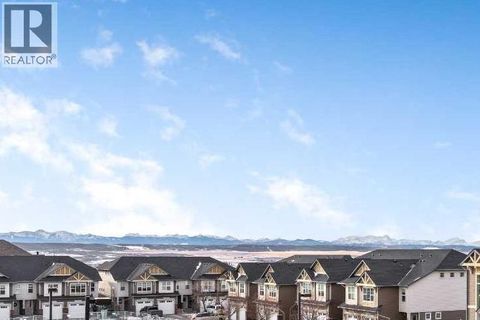 9313, 101 Sunset Drive Cochrane AB T4C0W7