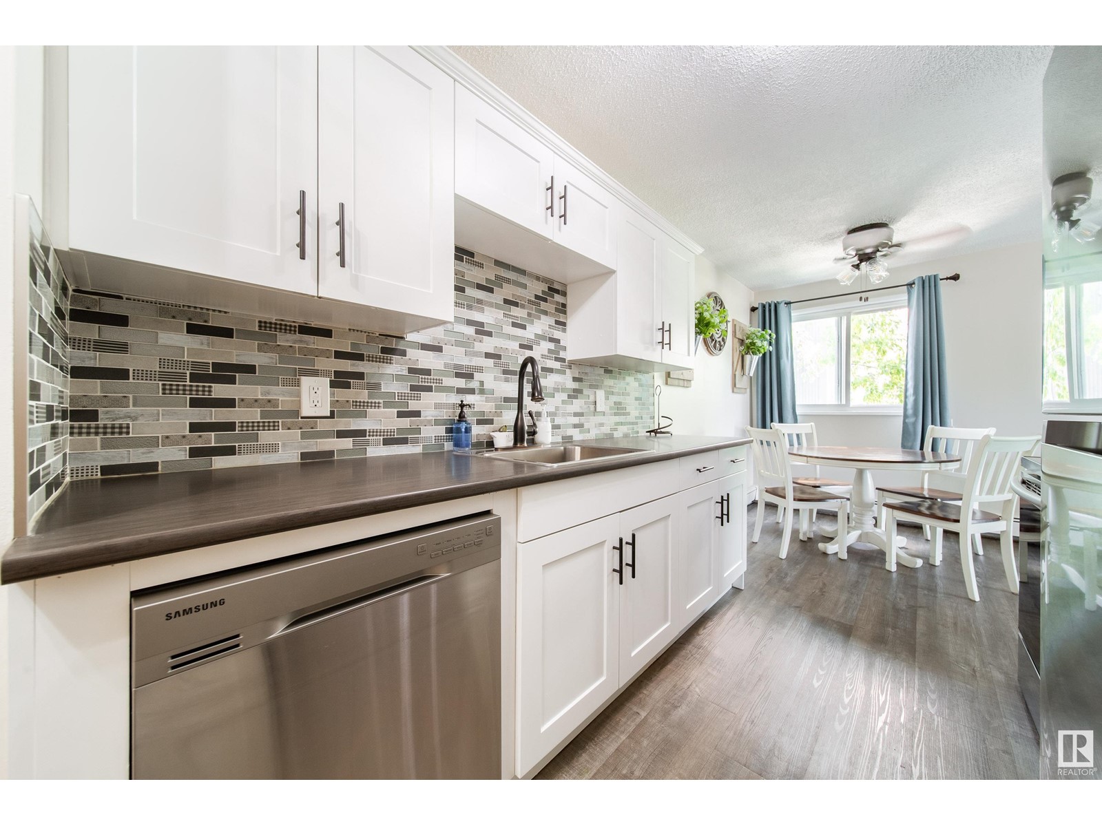 #303 10617 107 ST NW