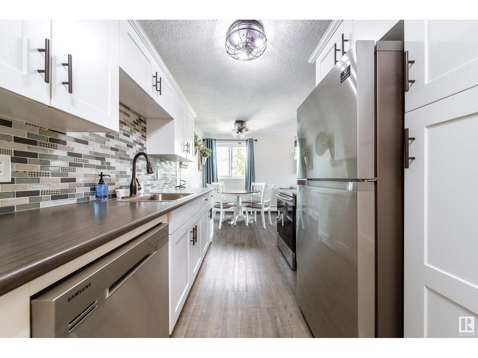 #303 10617 107 ST NW