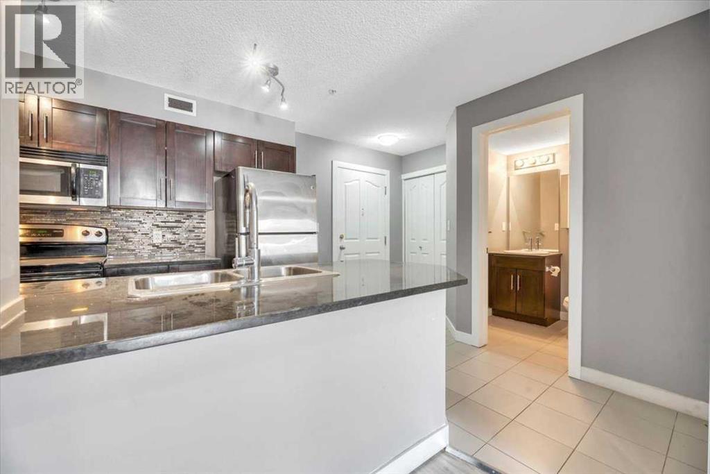 309, 7130 80 Avenue NE