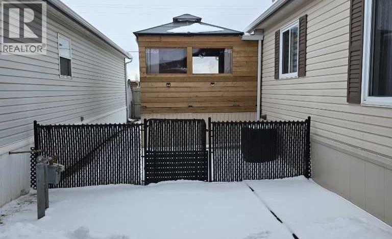 26, 1101 84 Street NE