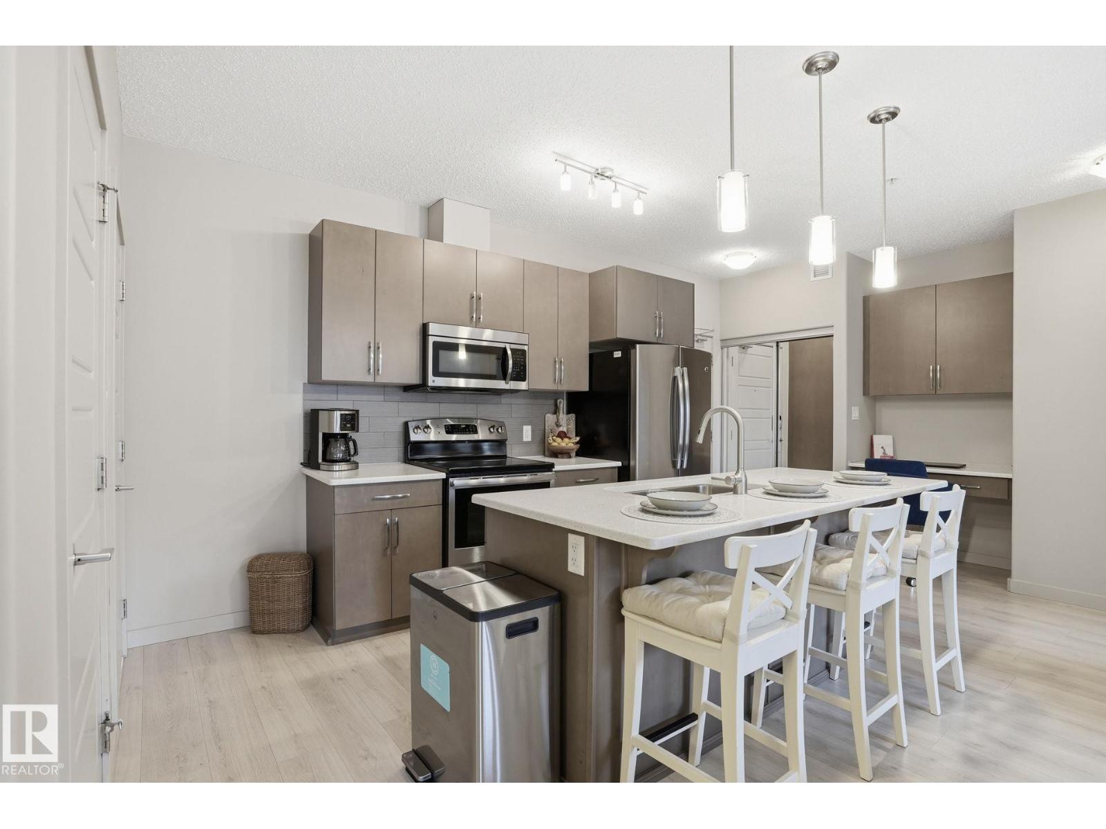 #303 320 Ambleside Link DR SW