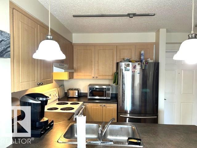 #212 616 MCALLISTER LO SW