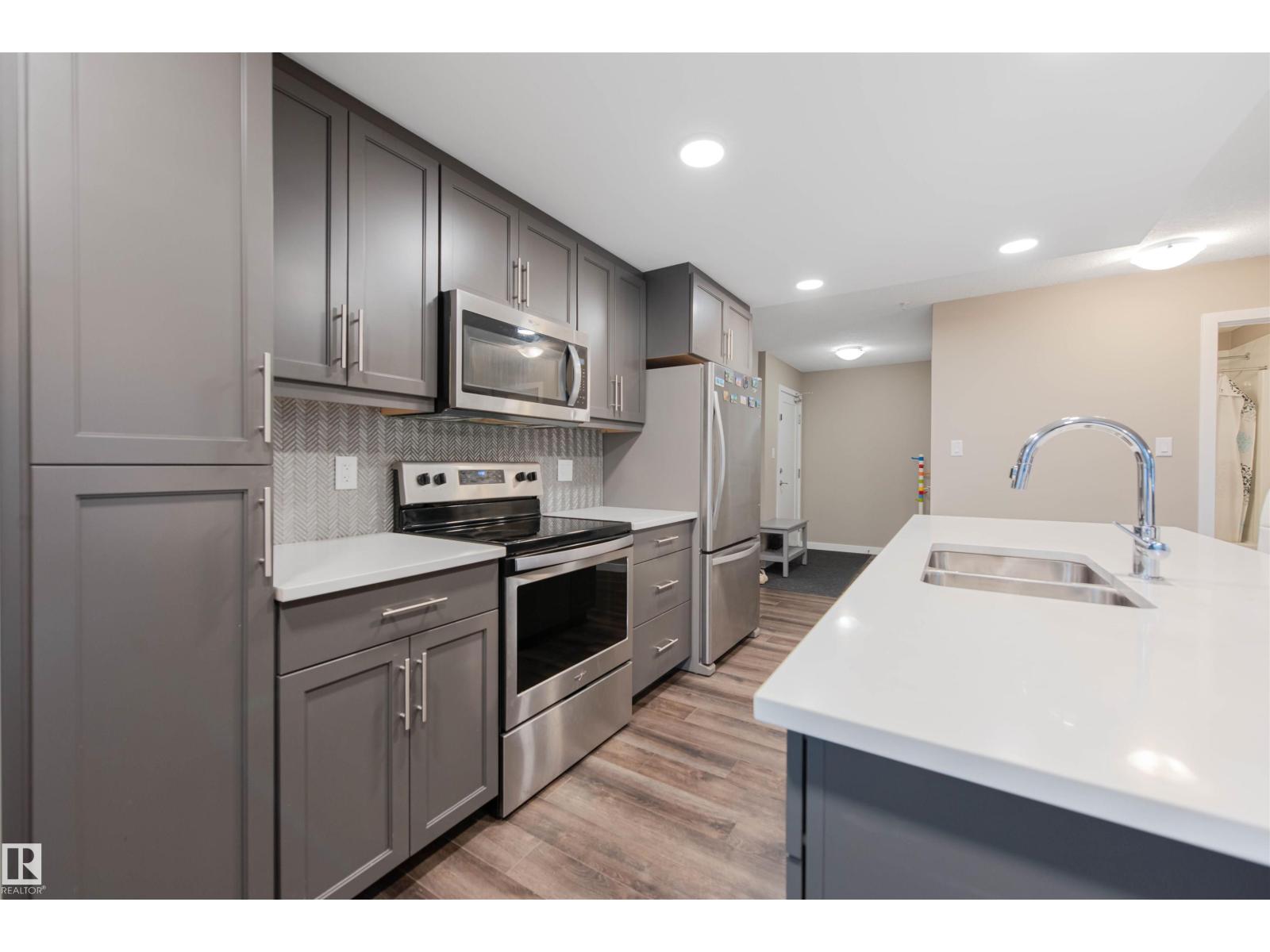 #121 5504 SCHONSEE DR NW