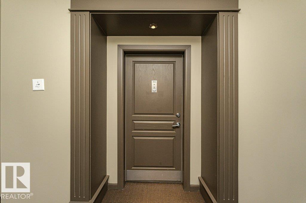 #302 160 MAGRATH RD NW