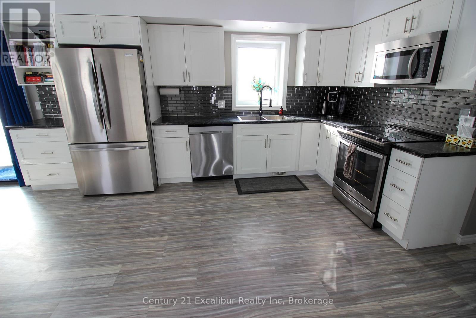 7104 SIXTH LINE ROAD W