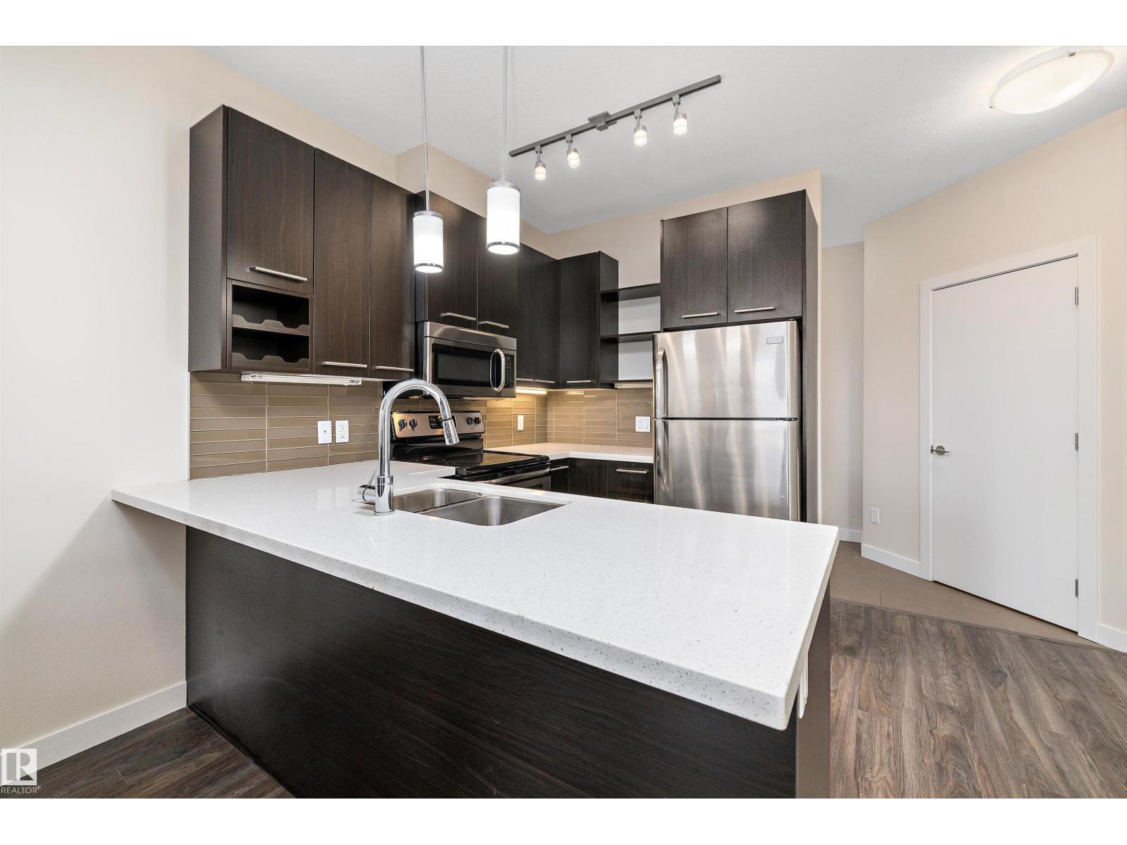 #408 10418 81 AV NW