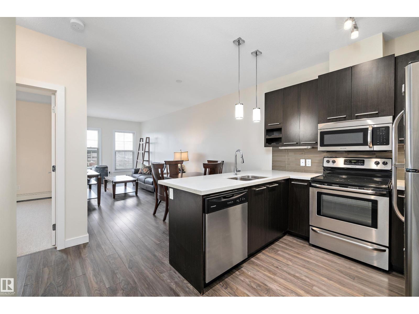 #408 10418 81 AV NW