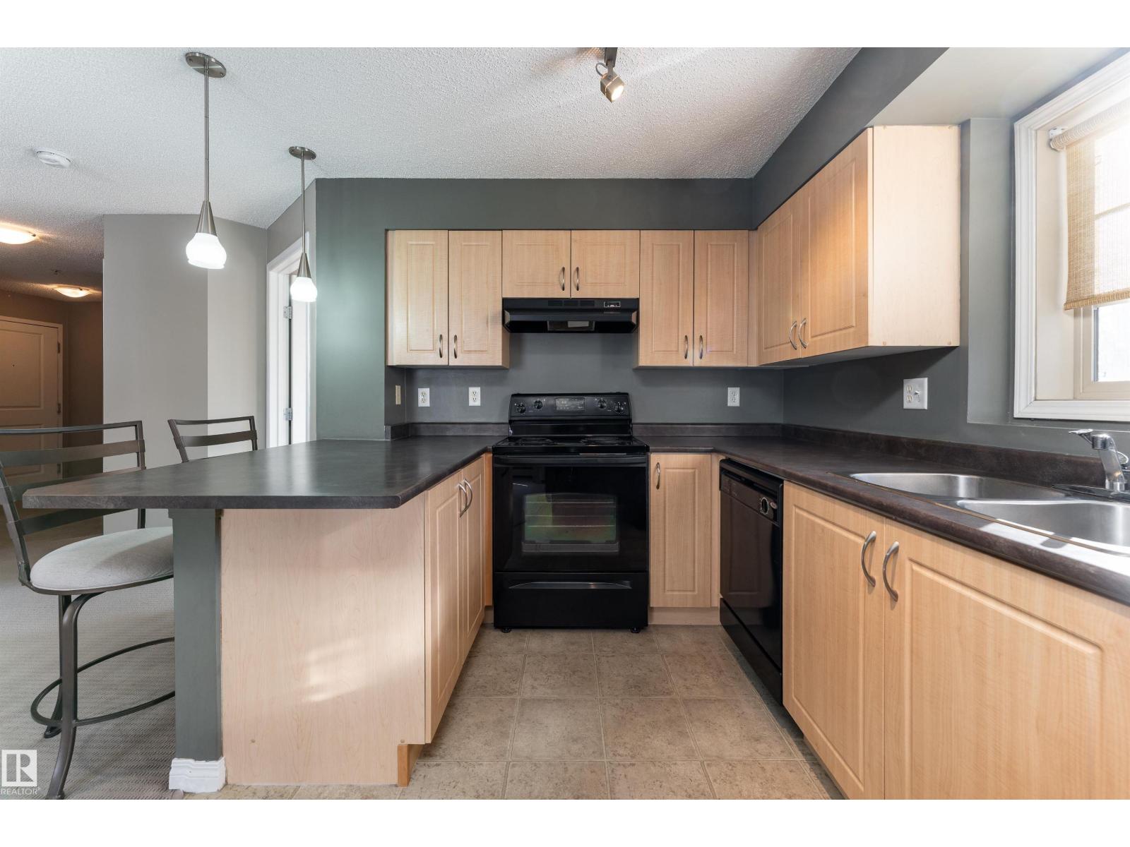 #202 11449 ELLERSLIE RD SW