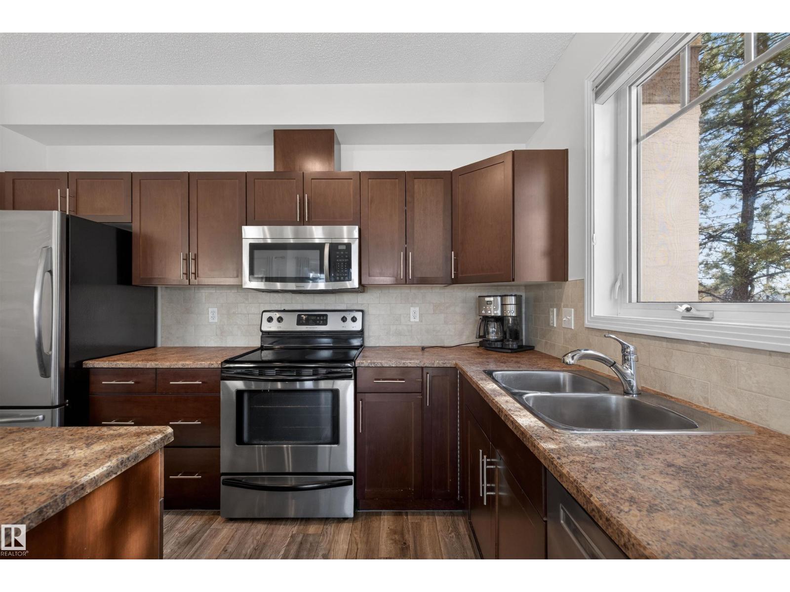 #103 2035 GRANTHAM CT NW